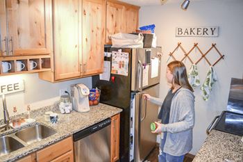 Girl Near Fridge at Campus Park, Minnesota, 55811